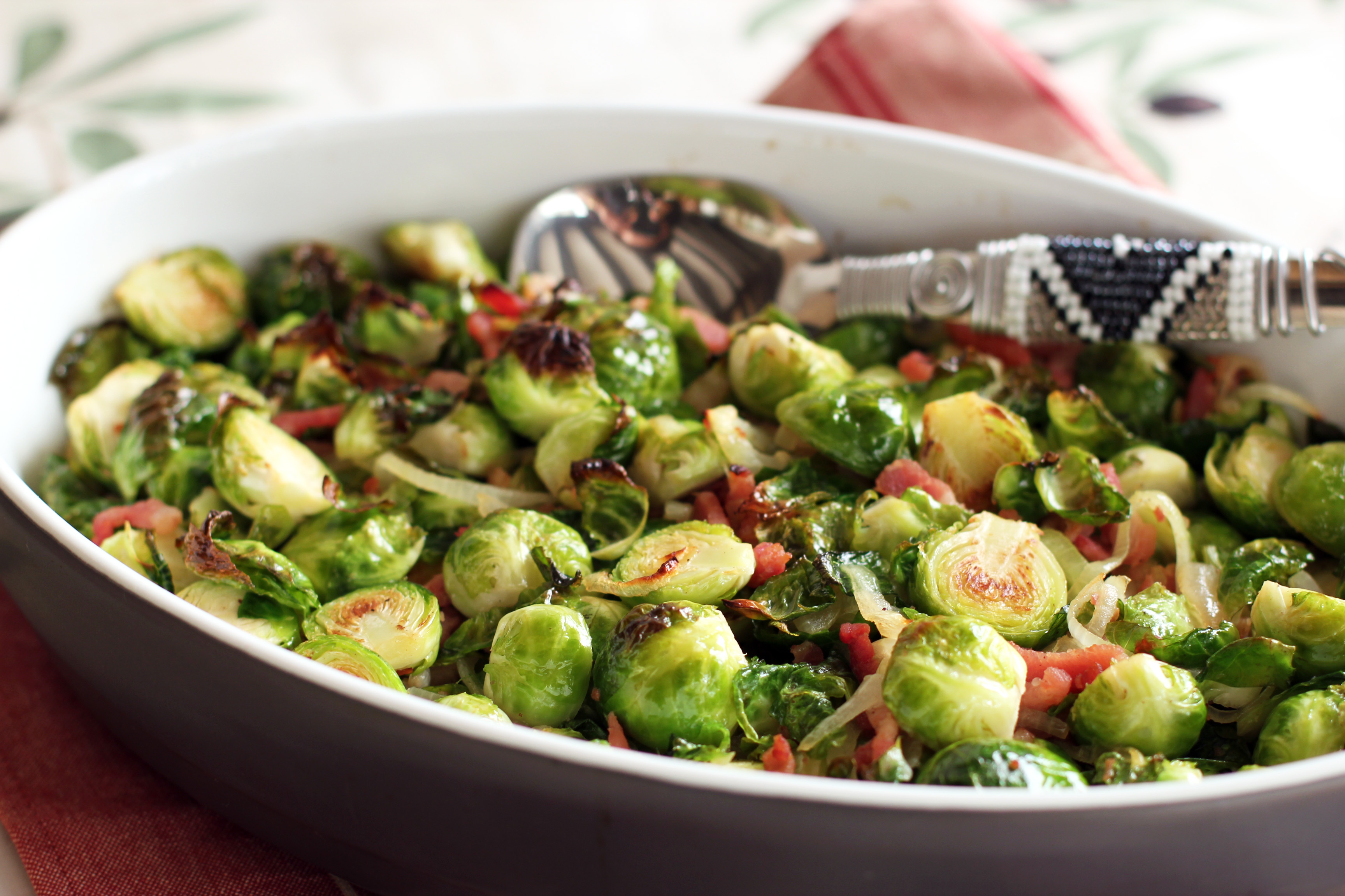 Green Brussels Sprouts in dish with spoon