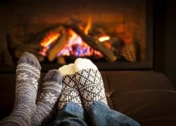 cosy socks in front of fireplace