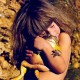 Tippi Degre huging a frog
