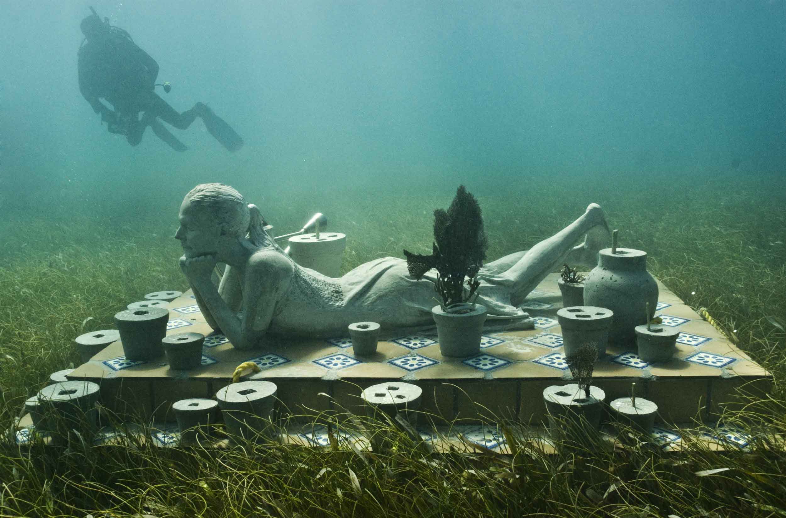 Underwater Museum in Cancun woman