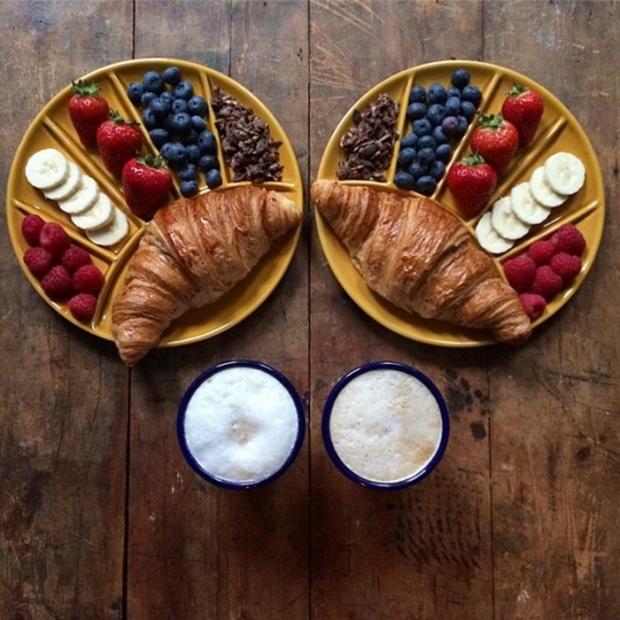 breakfast croissant coffee strawberries blackberries and nuts