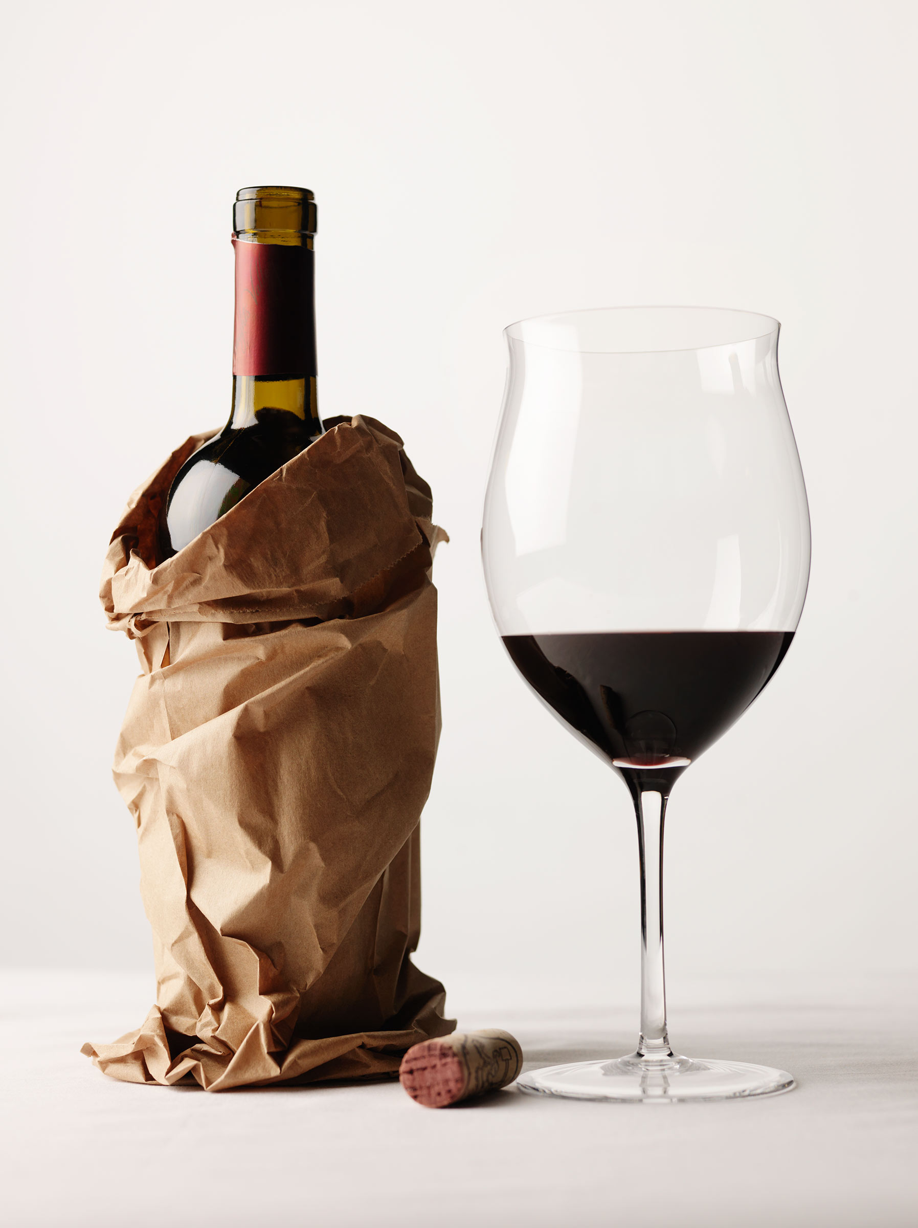 red wine in a bottle with a glass