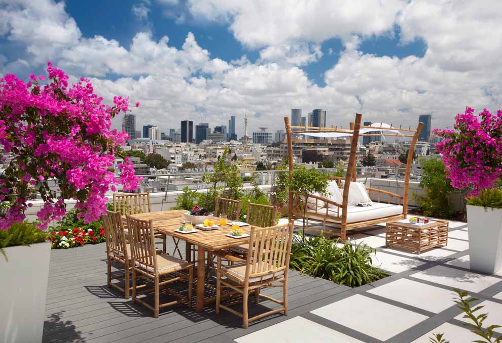 Spectacular-Hot-Pink-decorating-ideas-for-Ravishing-Deck-Contemporary-design-ideas-with-balcony-bougainvillea-concrete-paving-container-plants-daybed-deck-outdoor-dining-patio-furniture