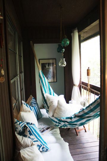 blue hammock with white pillows