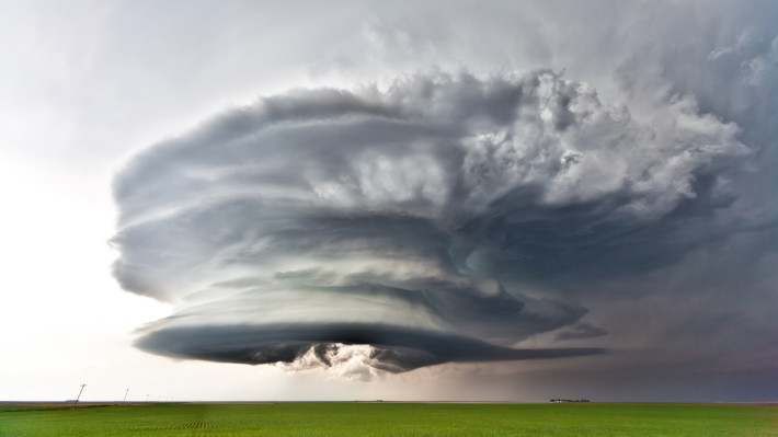 The first large scale geo-engineered mega project, clouds, storm, green grass