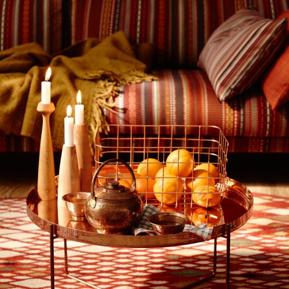deco-side-table-orange-candles-living-room-stripes-sofa-pillow-ceiling-red-yellow-orange-interior-design-ideas