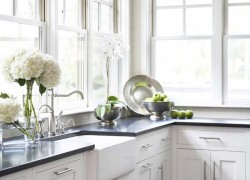 1-absolute-black-cooking-range-in-black-and-white-countertops-made-of-granite