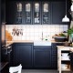 ikea-kitchen-system-in-black-kitchen-shelves-with-glass-doors
