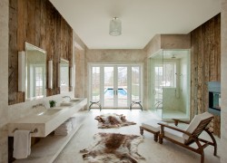 wood-wall-animal-fur-chaise-lounge-frankzosische-window-marble-shower-fireplace-opulent-and-rustic-bathroom-ideas