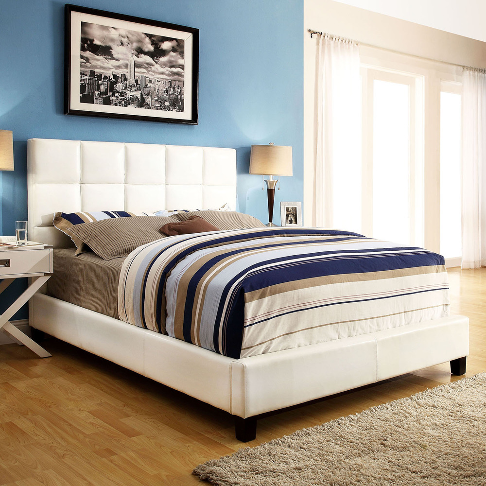 White platform bed with colorful bedding bedroom luxury beds