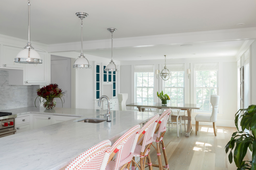 Dining Room dining table barstool hanging light leather armchair plants white-feng shui in the kitchen