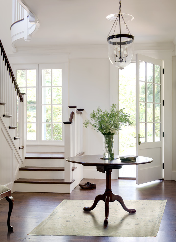 Foyer in white wood elements staircase-hallway