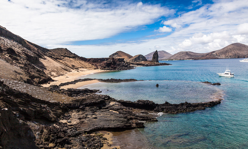 Galapagos-island-beach-seaside-boat-blue-water-beautiful-island