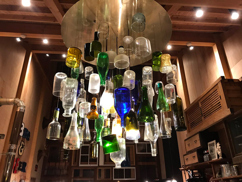 Kamikatz-Public-House-zero-waste-building-from-recycled-garbage-facade-Japan-town-Kamikatsu-lamp-from-used-colorful-bottles