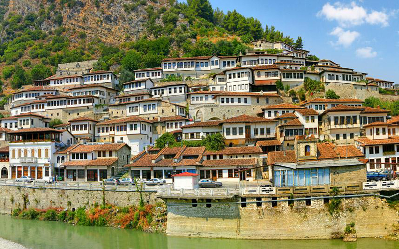 Shqipëria-Albanian-traditional-houses-near-road-beautiful-landscape-river-in-albania