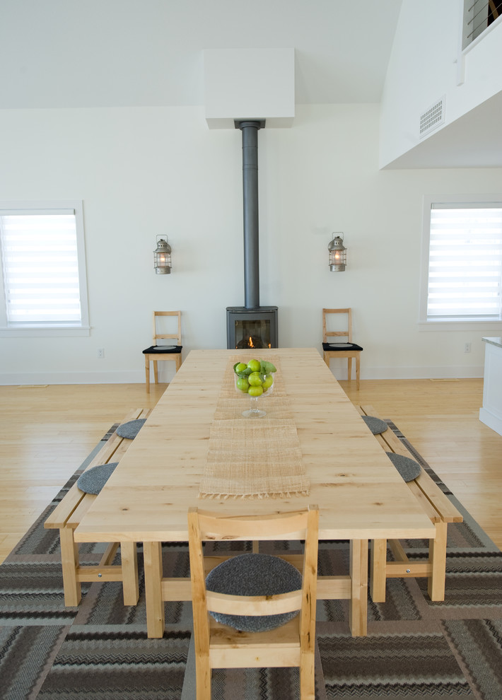 Bright dining room with wood stove-dining Tables