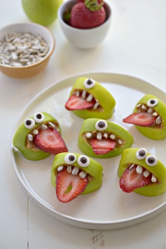 Halloween fun food green cookies bih teeth strawberries