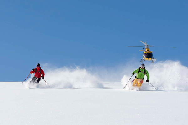 Riksgransen Sweden Two Skiiers Helicopter Ski Holidays Skiing