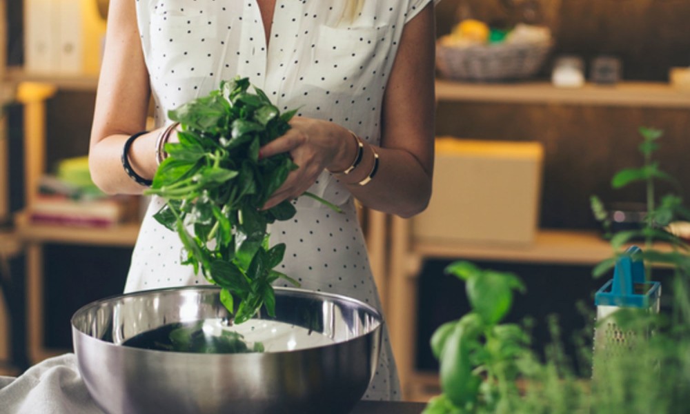 Indoor Herbs Garden Ideas PRETEND Magazine   Home Herbs Basil Woman In Kitchen Growing Herbs Indoors Herb Garden Window Herb Garden Kitchen Herb Garden Growing Herbs Herb Planter Indoor 1000x600 