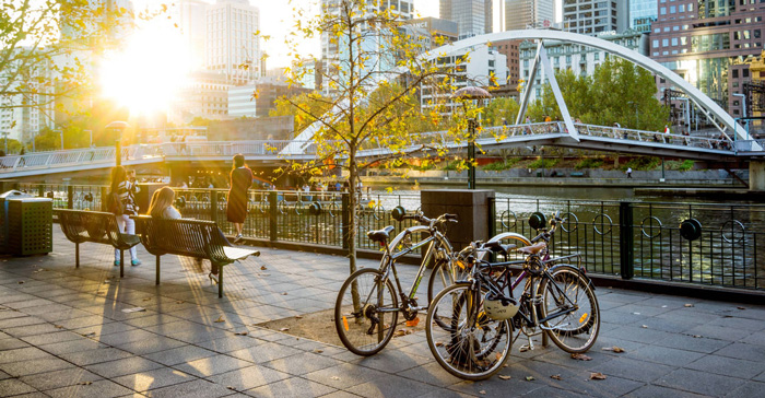 Melbourne-City-Bicycles-River-Bridge-Happy-People-solo-travel-companies-places-to-travel-alone-solo-female-travel-solo-travel-destinations