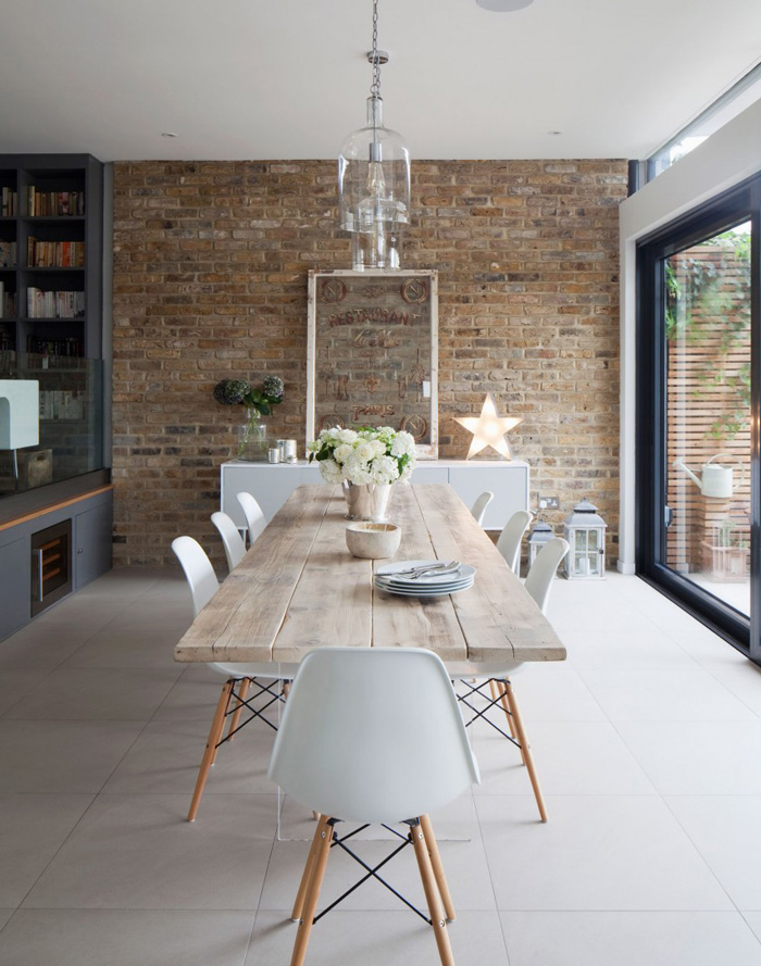 Brick-Wall-In-Dining-Room-Wooden-Table-Natural-Decor-Home-White-Cahirs-Scandinavian-Style-Dining-Room-Cozy-Home