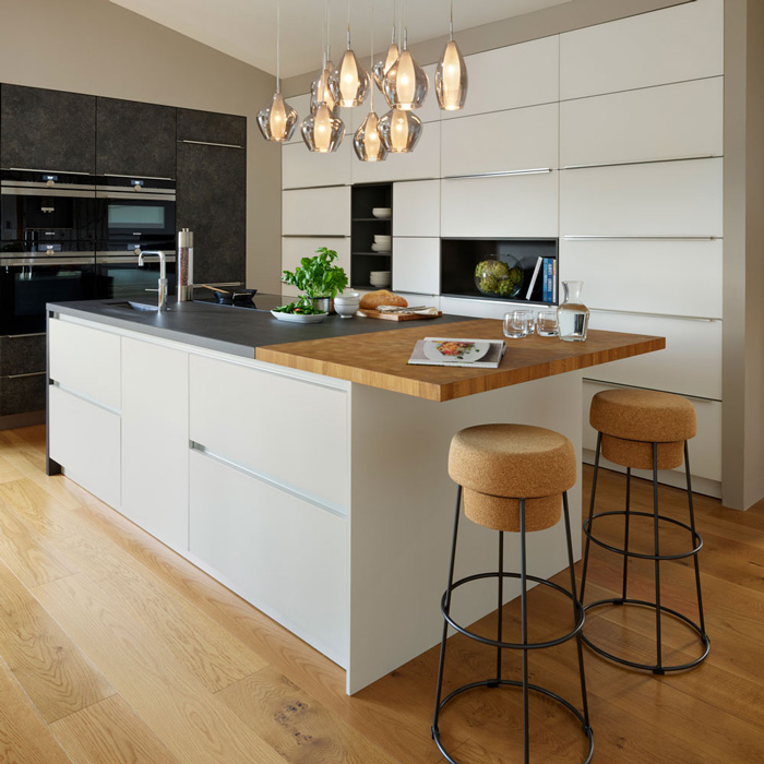 Modern-Big-KItchen-Island-with-Cork-Modern-Chairs-Big-Storage-Space