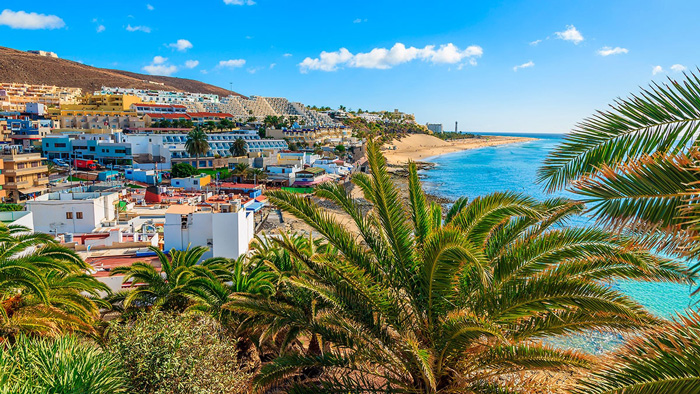 Fuerteventura-Canary-Islands-Colorful-Hotels-Beach-Palms-Sunny-tropical-vacations-tropical-vacation-spots-tropical-vacation-destinations-beach-vacation-spots-tropical-island-holidays-tropical-places