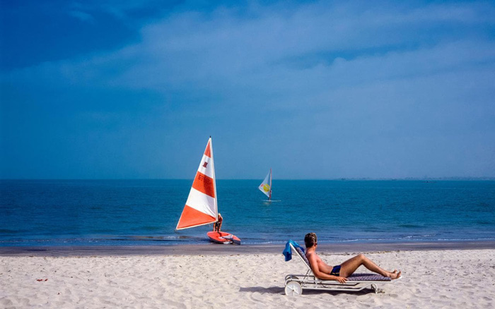 Gambia-Beach-Lonely-man-on-the-beach-Boats-tropical-vacations-tropical-vacation-spots-tropical-vacation-destinations-beach-vacation-spots-tropical-island-holidays-tropical-places