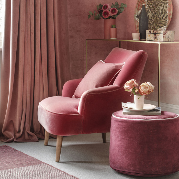 Coral-and-blush-pink-wall-paint-design-soft-velvet-armchair-pink-decoration