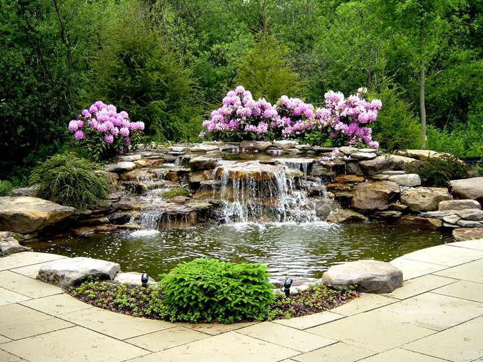 Natural-Looking-Garden-Waterfall-with-Flowers