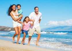 Happy-family-On-The-Beach-Family-Vacations
