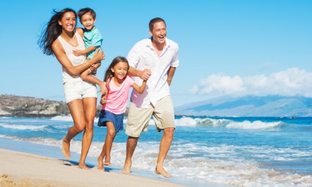 Happy-family-On-The-Beach-Family-Vacations