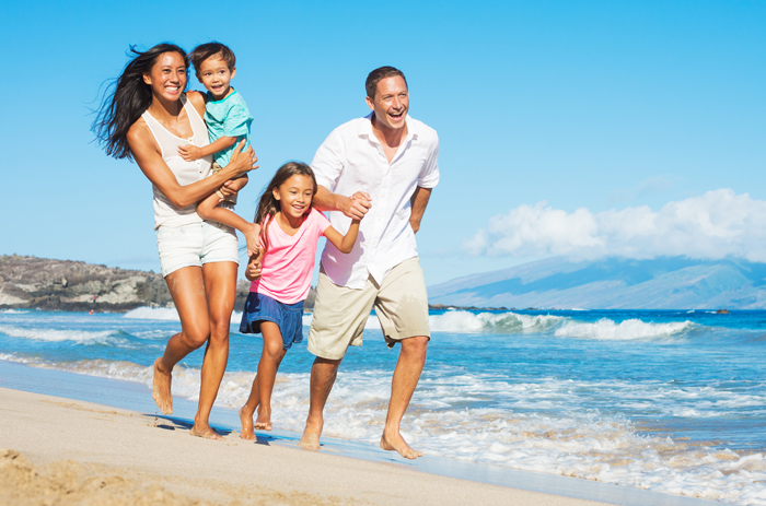 Happy-family-On-The-Beach-Family-Vacations