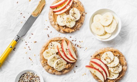 Toasts with apple banana peanut butter and seeds