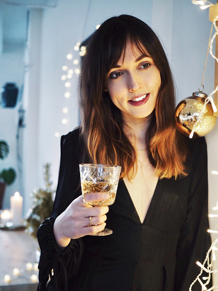 Woman Drinking champagne on New Years Eve 