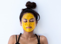 Woman with Natural Yellow Face Mask