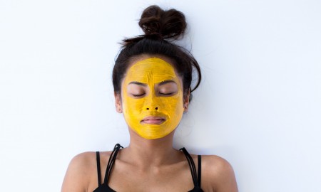 Woman with Natural Yellow Face Mask