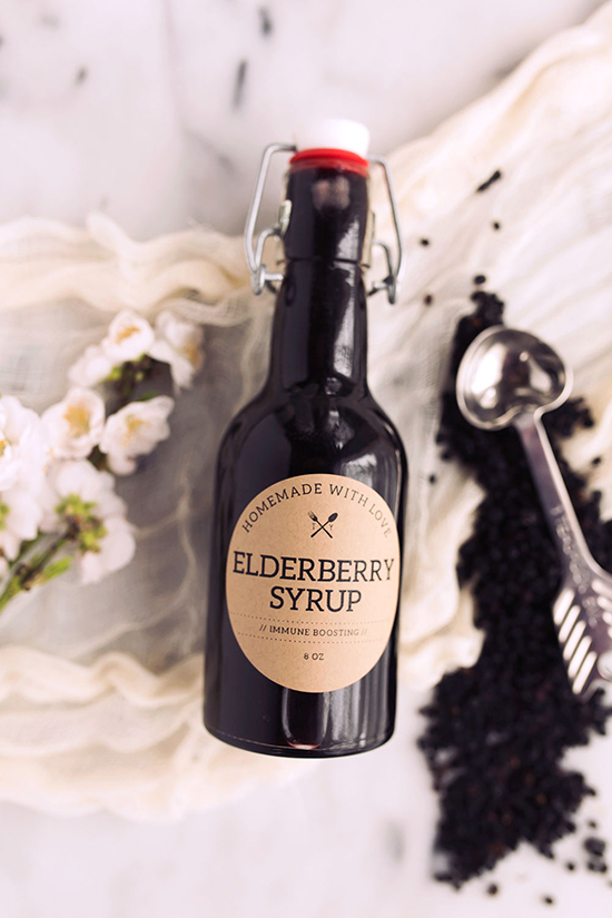 Homemade Elderberry Syrup in a glass bottle