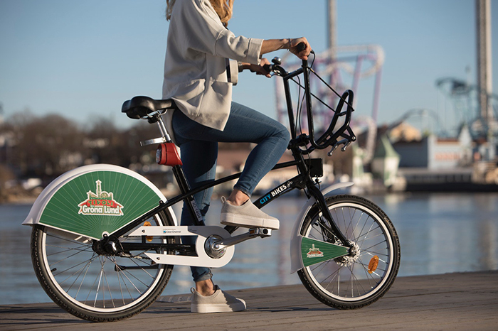 Woman with bike in Stockholm 