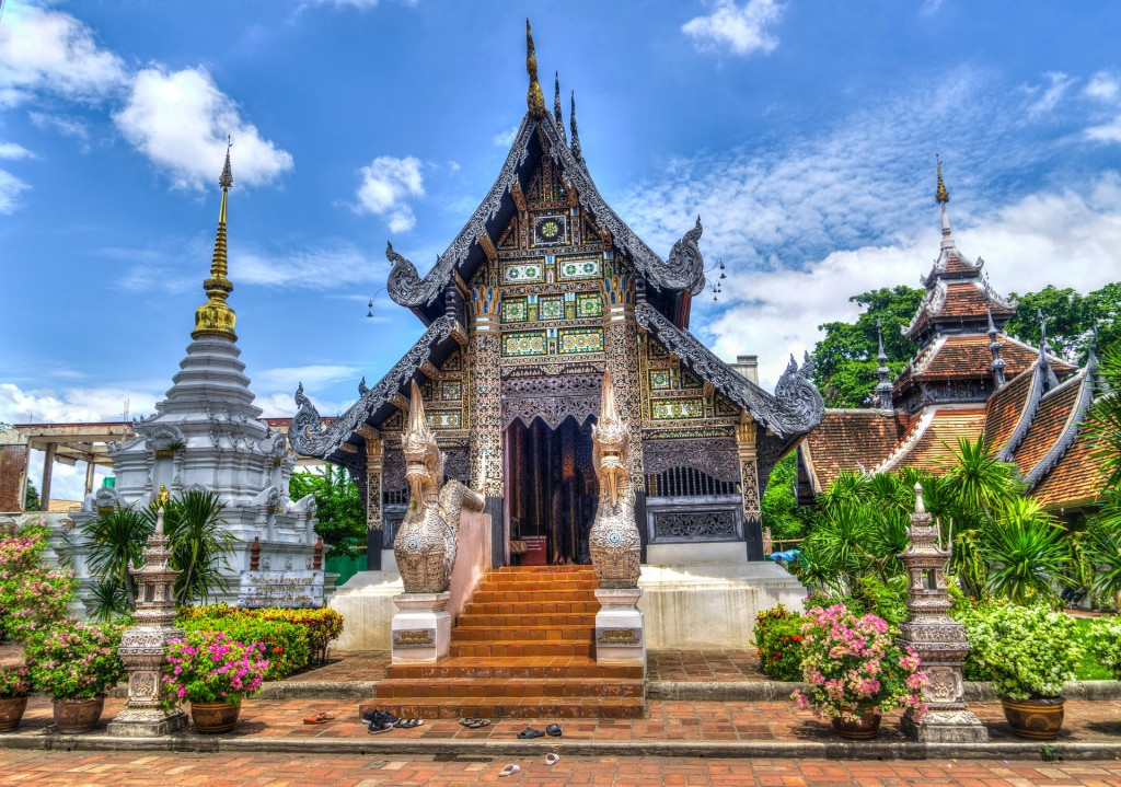 Colorful temple in Thailand surrounded with nature