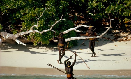 Sentinelese warriors holding arrows