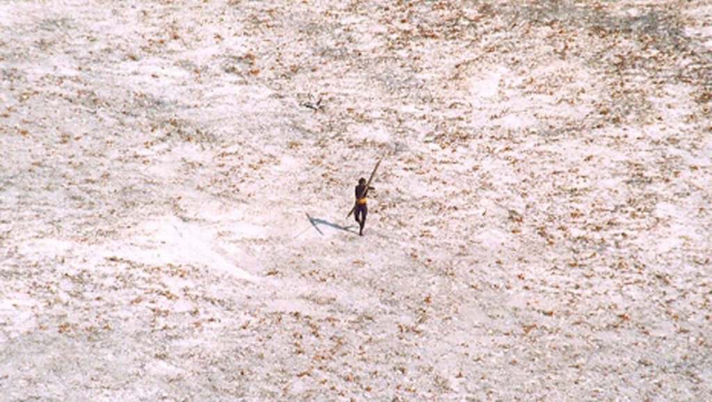 Inhabitant of North Sentinal Island running with an arrow