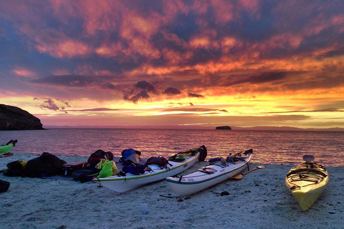 Kayaks on the beach with beautiful sunshine in Baja Peninsula, Mexico