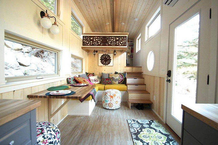 Wooden tiny house interior with large table