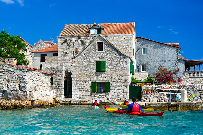 Men kayaking in Dalmatia Croatia