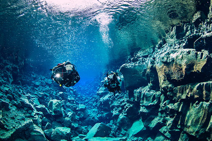 Diver in Pingvallavatn Lake Iceland