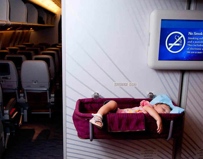 Baby sleeping on a plane