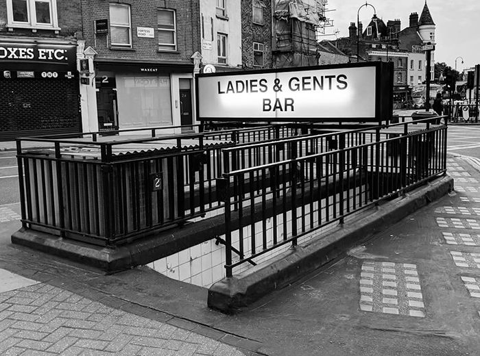 Ladies & Gents entrance in the hidden bar in London