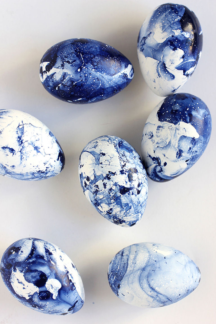White and blue nail polish marble Easter eggs