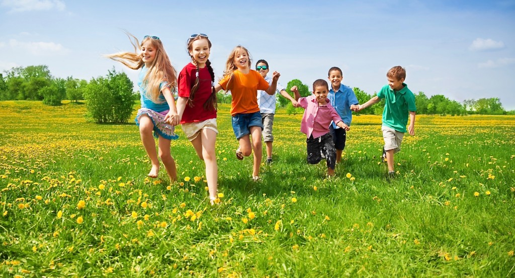 Kids running on the meadow